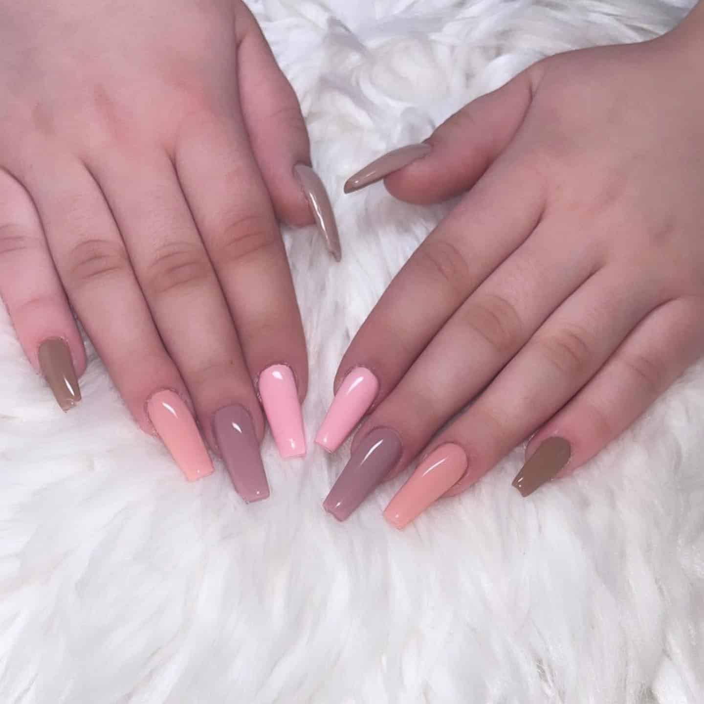 1. Neutral Ombré Coffin Nails in Blush, Taupe, and Mocha - multicolored nail ideas