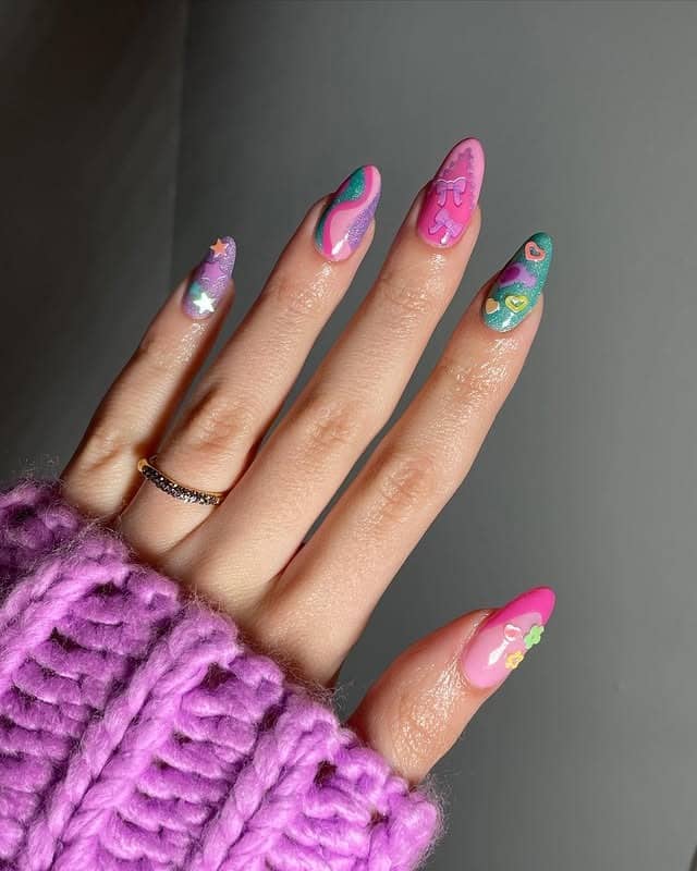 8. Playful Graphic Almond Nails with Hearts and Stars - multicolored nail ideas