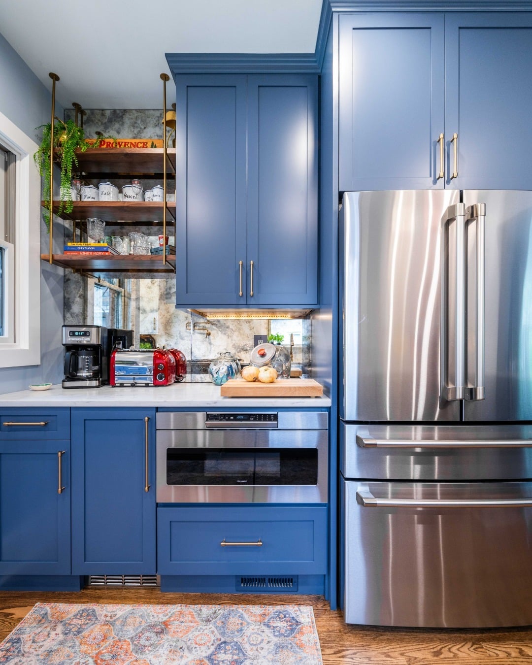 8. Transitional Blue Kitchen with Bright White Counters - gray and blue kitchen ideas