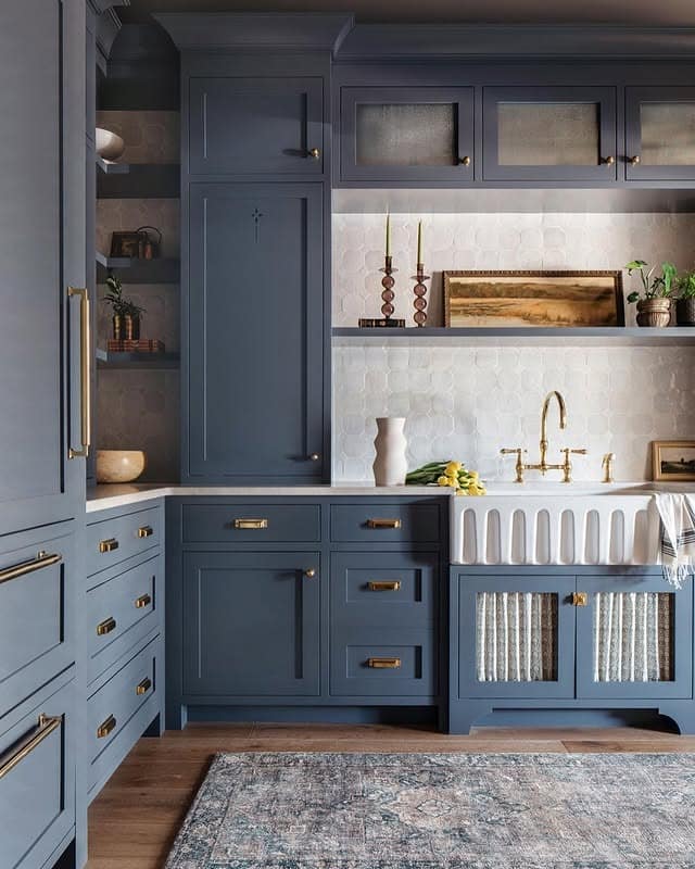 10. Refined Blue-Gray Kitchen with Textured Tile Accents - gray and blue kitchen ideas