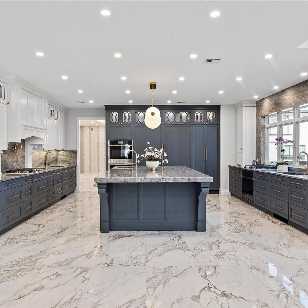 11. Charcoal Blue Luxury Kitchen with Marble Flooring - gray and blue kitchen ideas