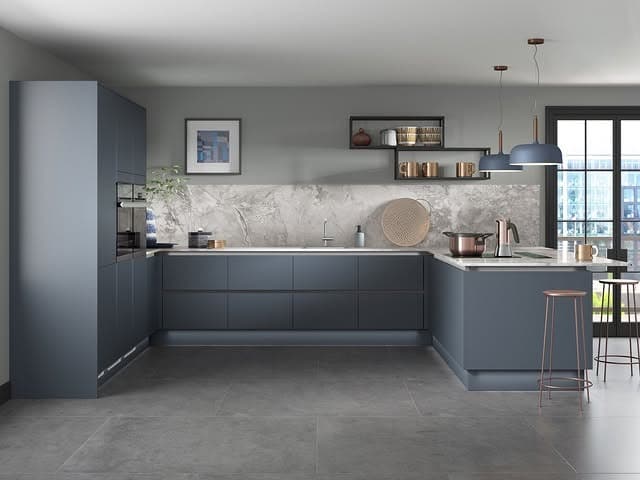 12. Matte Blue Modern Kitchen with Concrete Gray Floors - gray and blue kitchen ideas