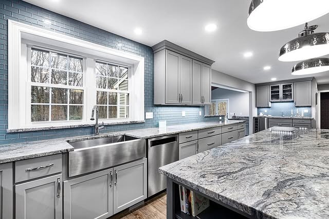 15. Gray Shaker Kitchen with Blue Tile Backsplash - gray and blue kitchen ideas