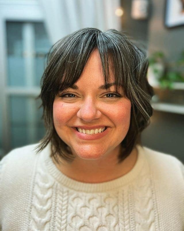 14. Layered Shaggy Bob with Feathered Bangs in Dark Ash Brown - Short Hairstyles with Bangs