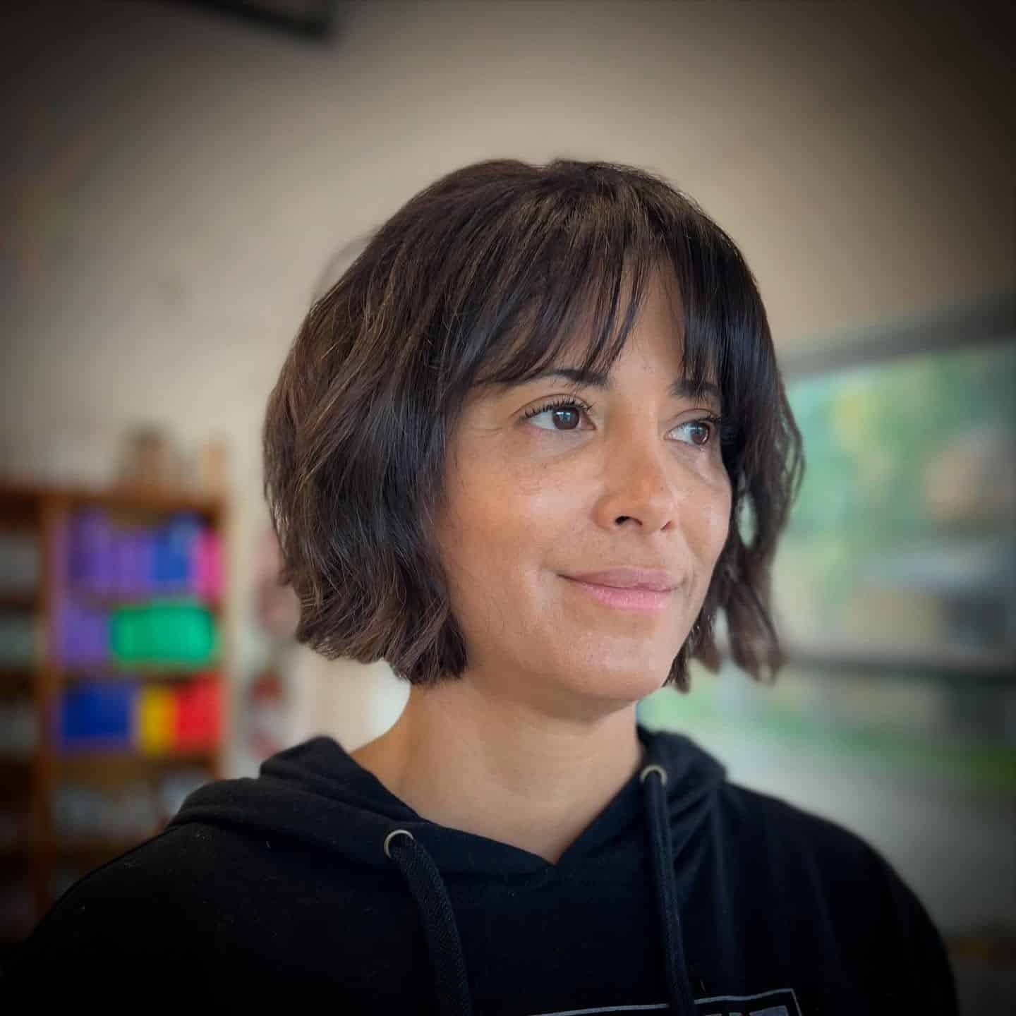 20. Soft Rounded Bob with Light Bangs in Deep Mocha Brown - Short Hairstyles with Bangs