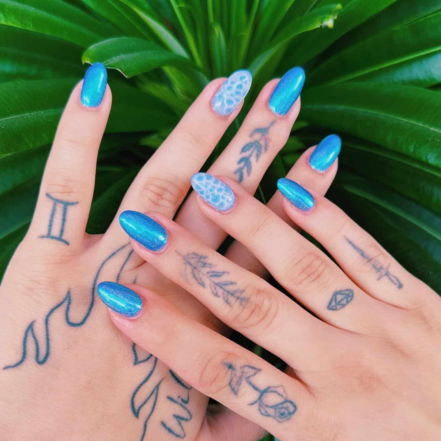 6. Ocean Pearl Texture Nails in Shimmering Aqua Blue - nautical nail ideas