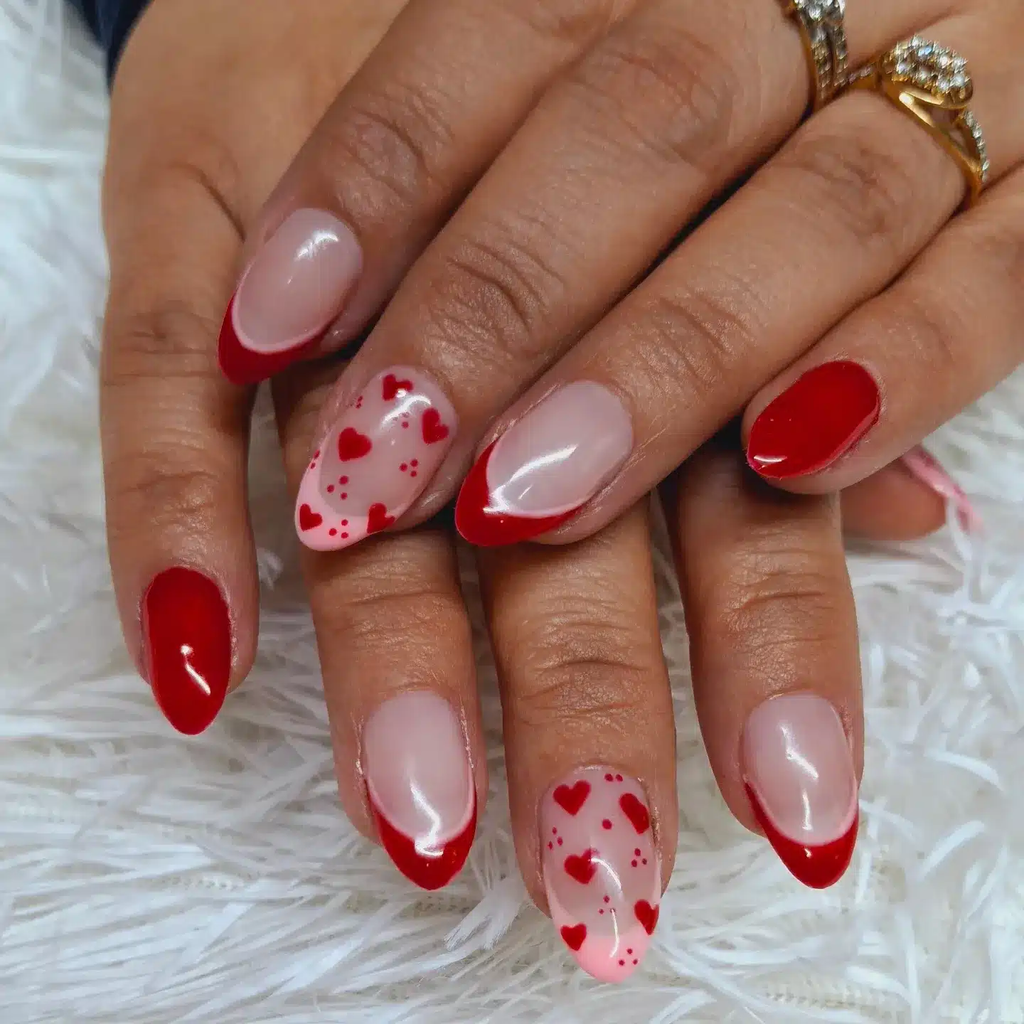11. Red French Tip Almond Nails with Heart Accent Art - nautical nail ideas