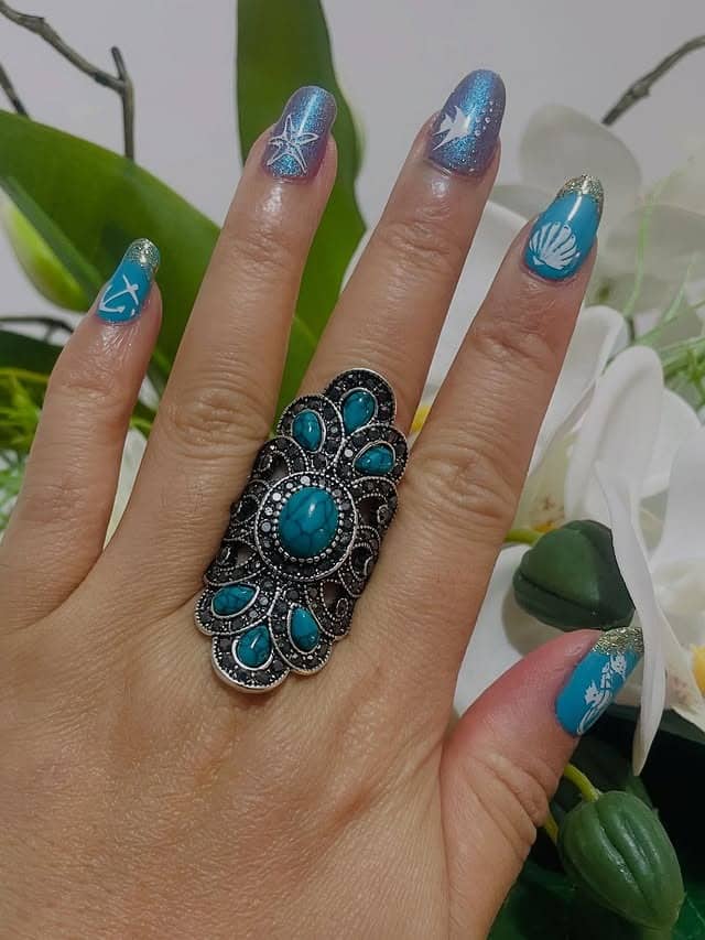 16. Turquoise and Silver Coastal Accent Nails with Shell Art - nautical nail ideas