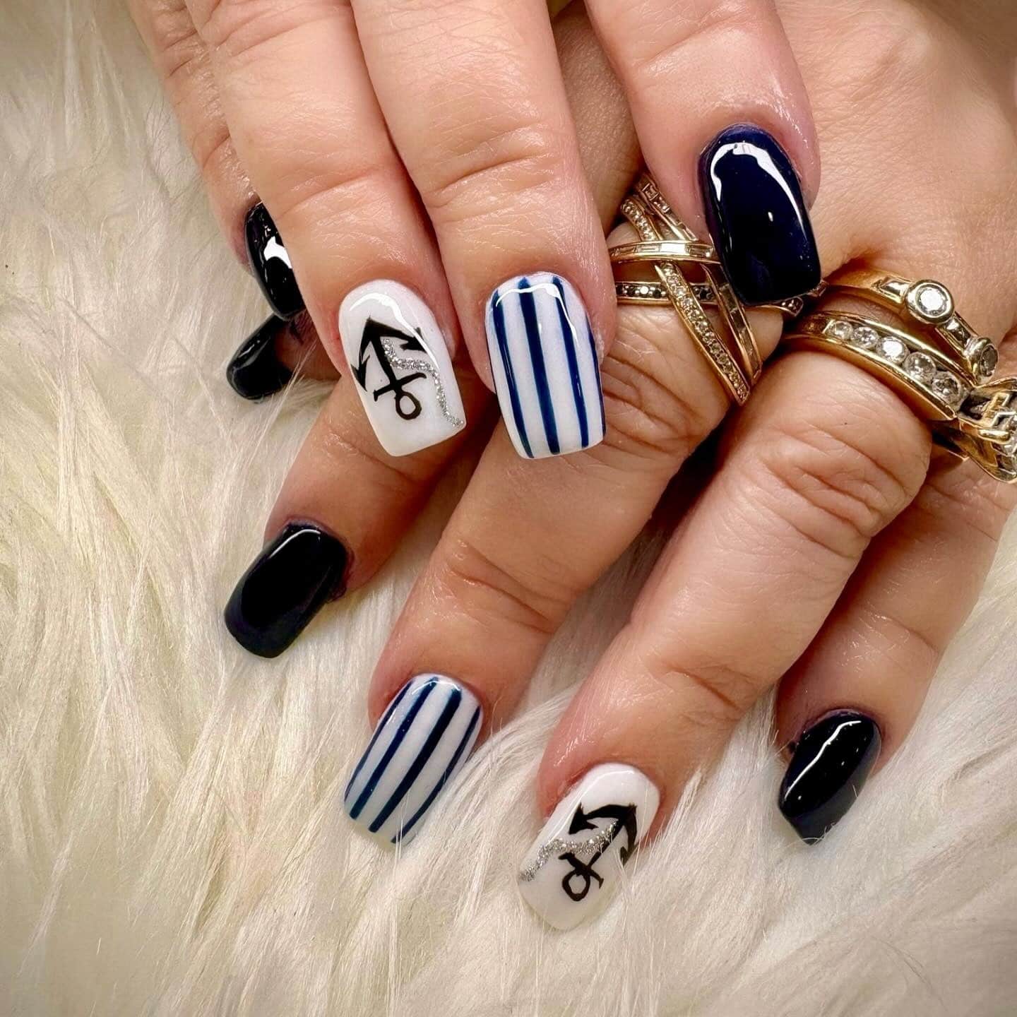 18. Navy, White, and Stripe Square Nails with Anchor Motifs - nautical nail ideas