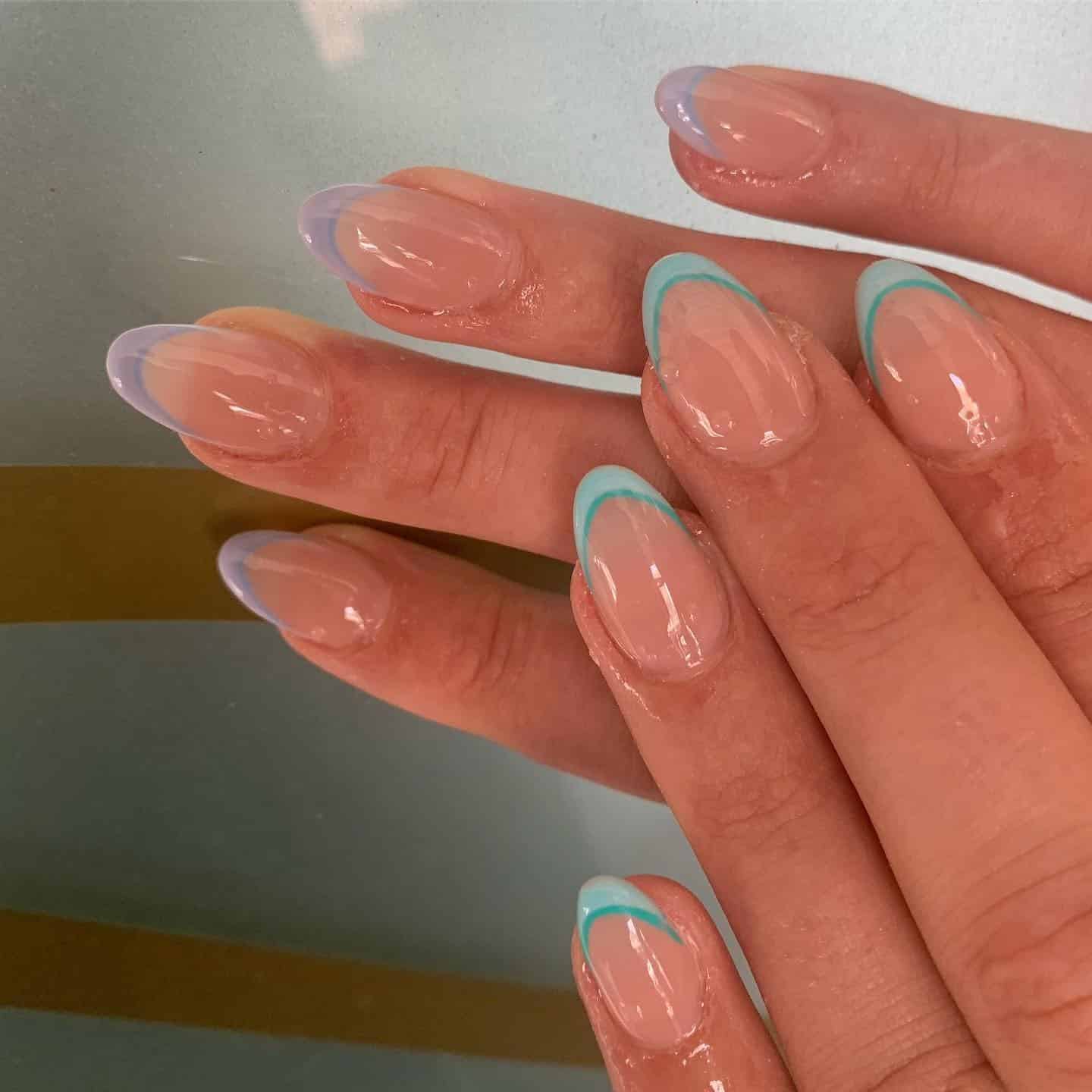 19. Pastel Blue and Aqua French Tip Almond Nails - nautical nail ideas