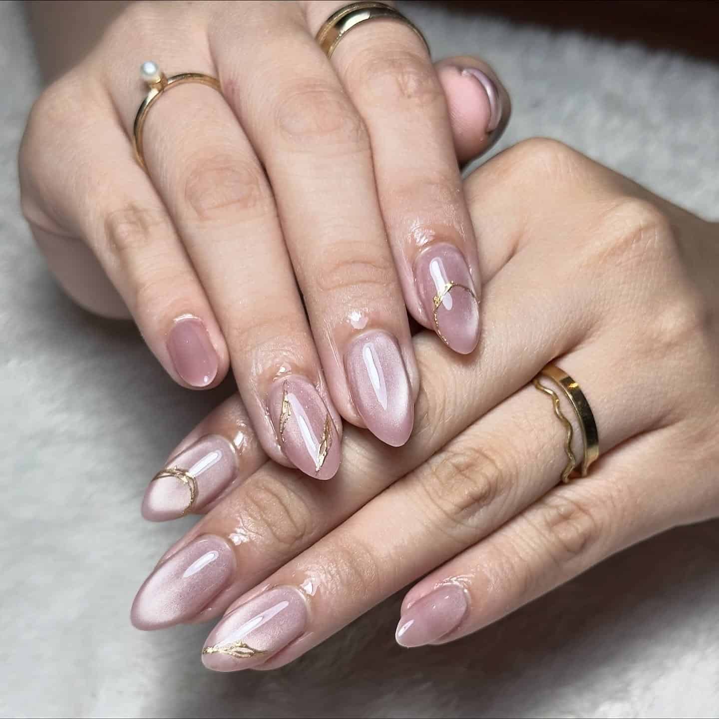 13. Rose Quartz Ombre Chrome Almond Nails with Gold Veins - ombre chrome nail ideas