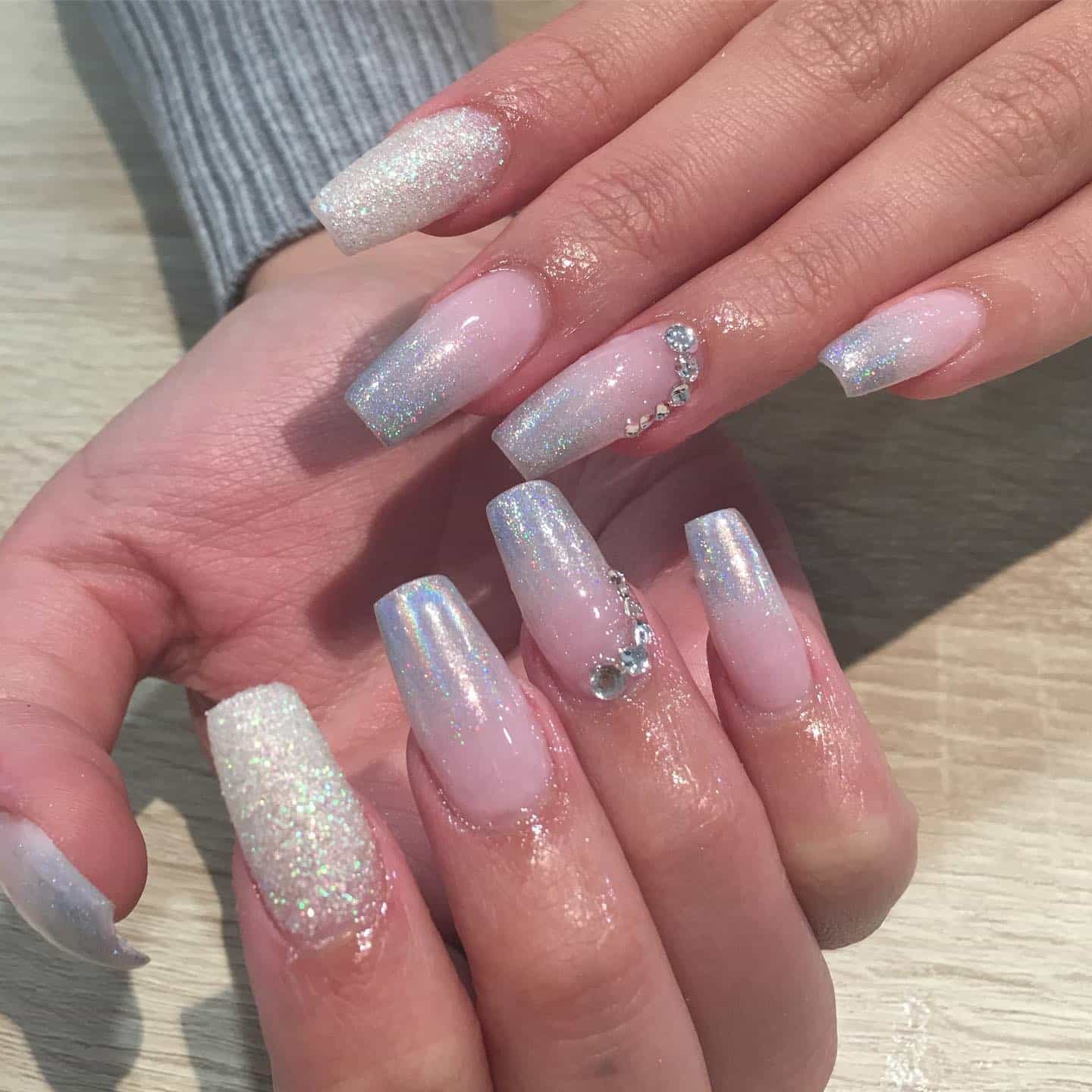 14. Crystal White Ombre Chrome Coffin Nails with Rhinestones - ombre chrome nail ideas