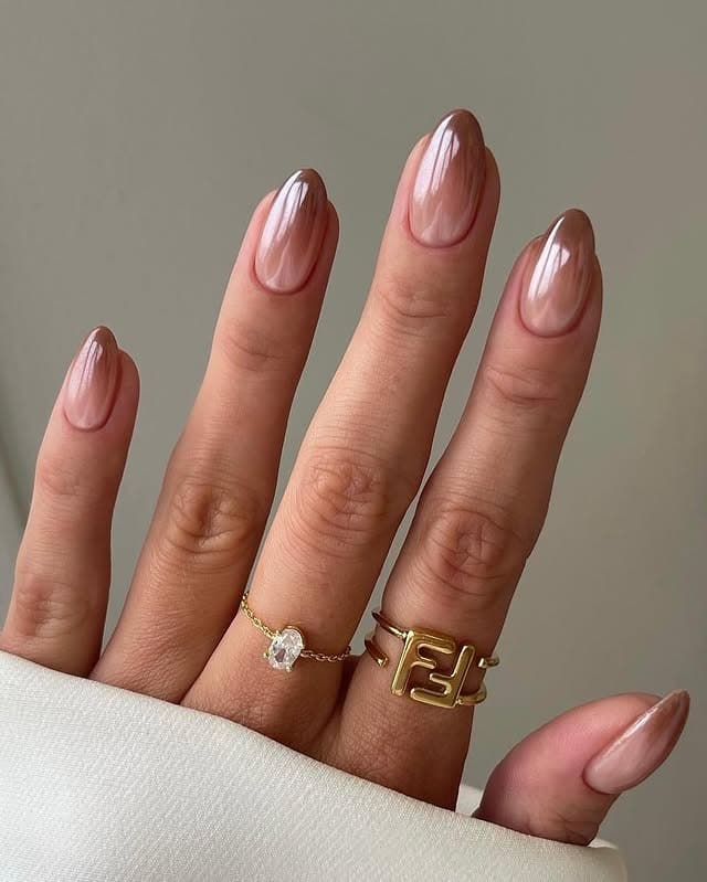 17. Mocha Nude Ombre Chrome Almond Nails - ombre chrome nail ideas