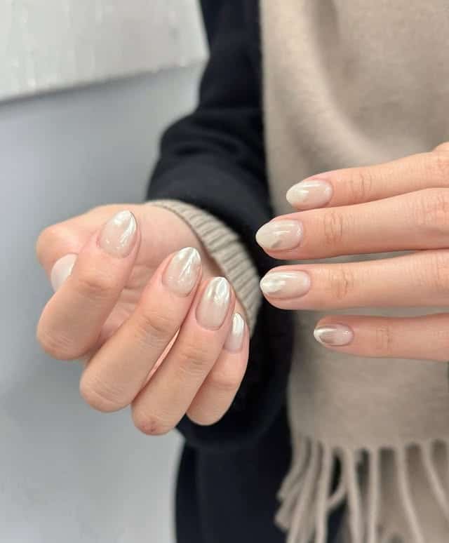 19. Pearl Beige Ombre Chrome Short Almond Nails - ombre chrome nail ideas