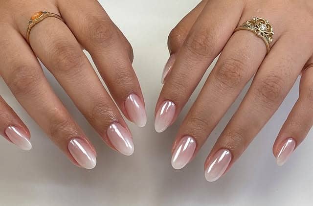 22. Soft Pink Pearl Ombre Chrome Almond Nails - ombre chrome nail ideas