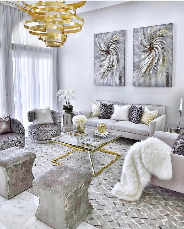 7. Contemporary Glam Living Room in Ivory and Gold - gold living room ideas