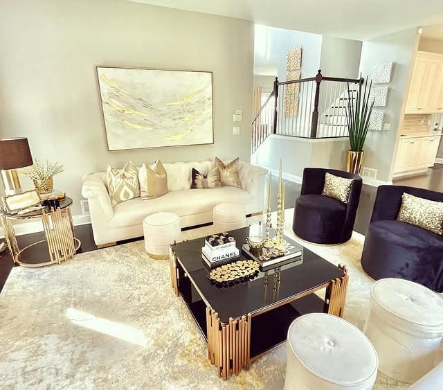 8. Chic Black and Gold Living Room with Modern Lines - gold living room ideas
