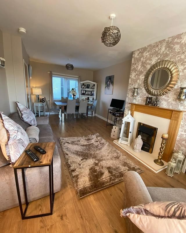 11. Cozy Neutral Living Room with Subtle Gold Touches - gold living room ideas