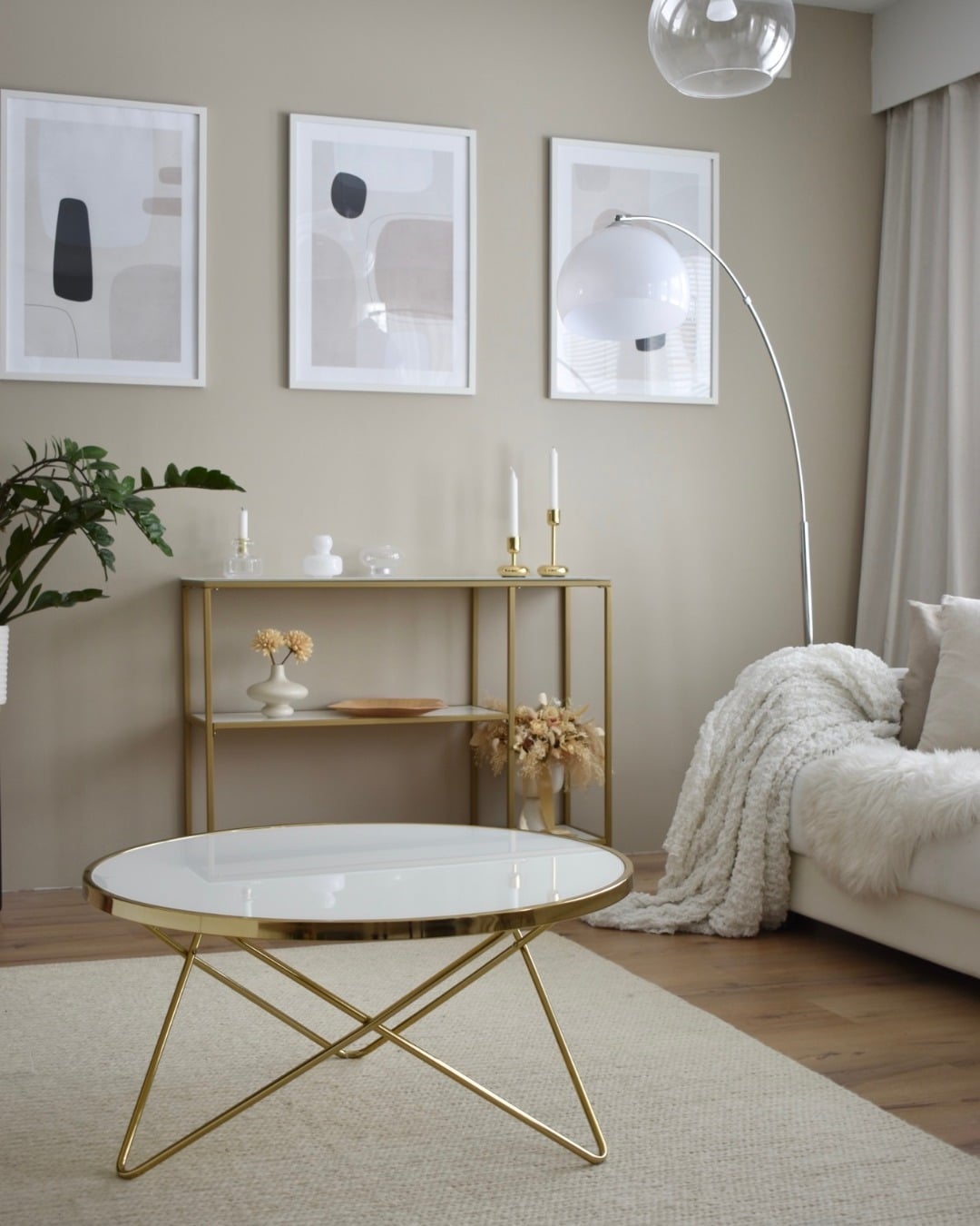 18. Minimal Neutral Living Room with Clean Gold Lines - gold living room ideas