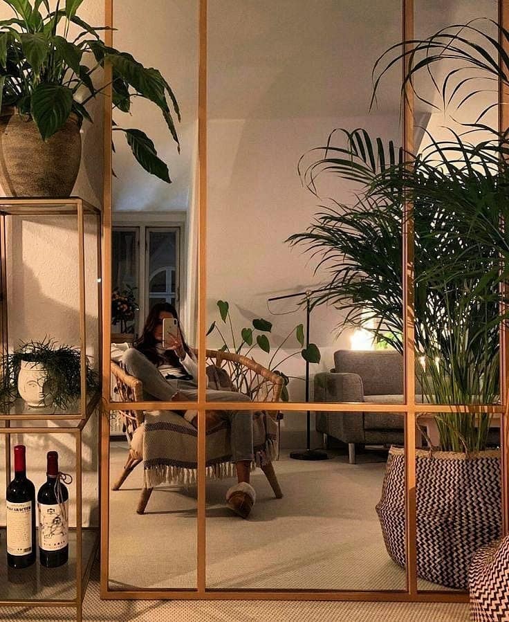 9. Large Grid Mirror for a Cozy Living Room Setting - living room mirror ideas