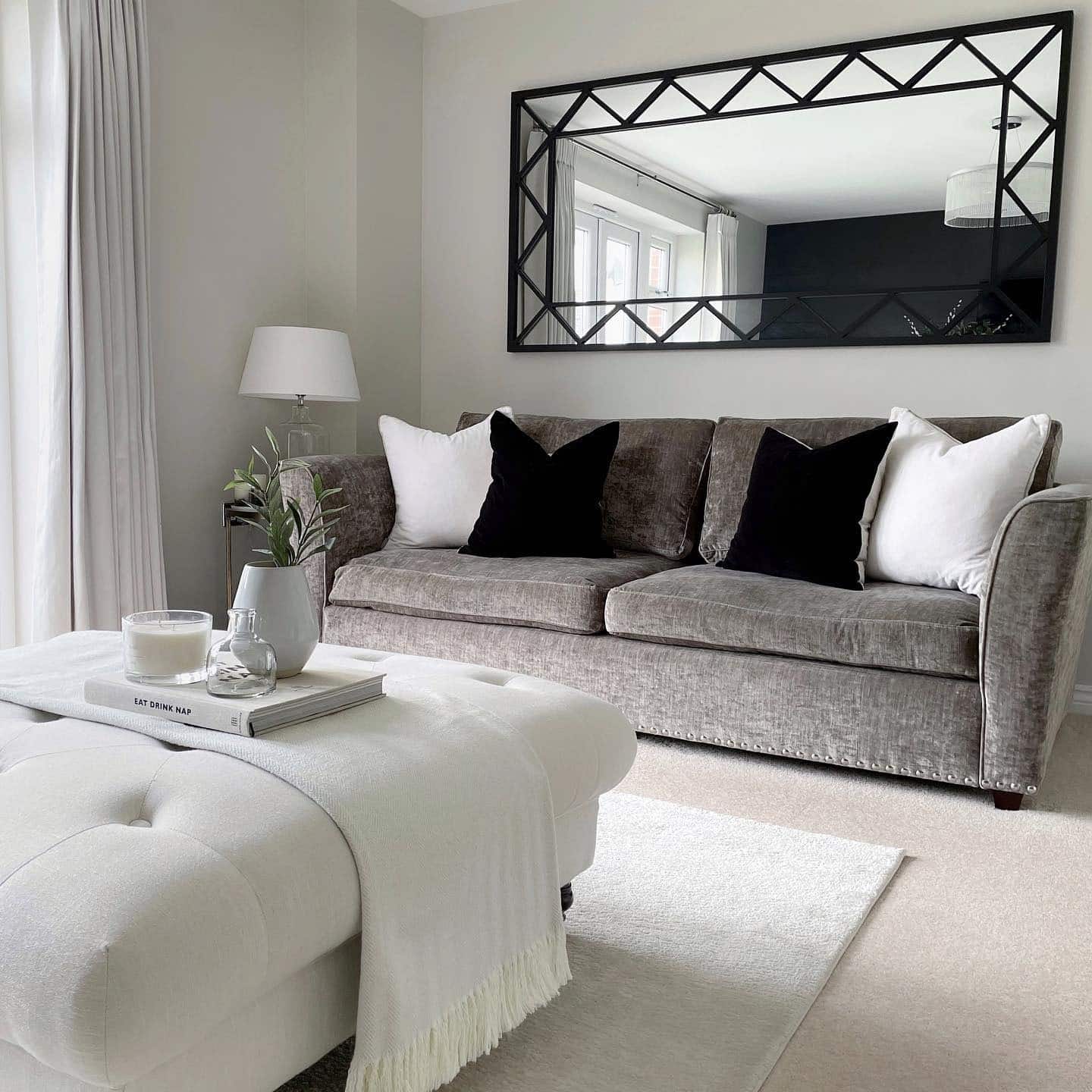 19. Geometric Frame Mirror with Neutral Upholstery - living room mirror ideas