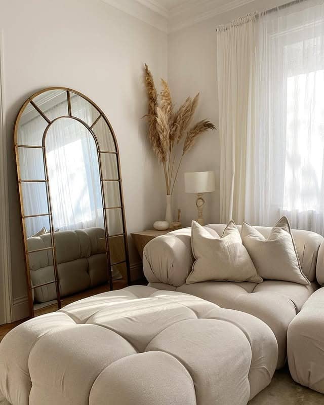 22. Arched Gold Mirror with Cream Living Room Styling - living room mirror ideas