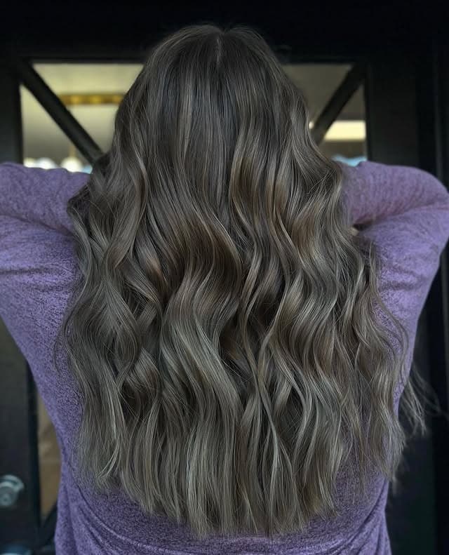 4. Smoky Charcoal Balayage Waves - Dark Hair Color