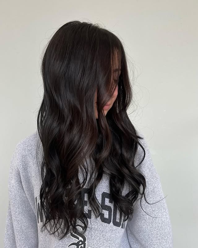 16. Deep Brunette Loose Curls - Dark Hair Color