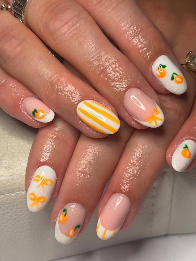 12. White Almond Nails with Orange Citrus Nail Art - orange and white nail ideas