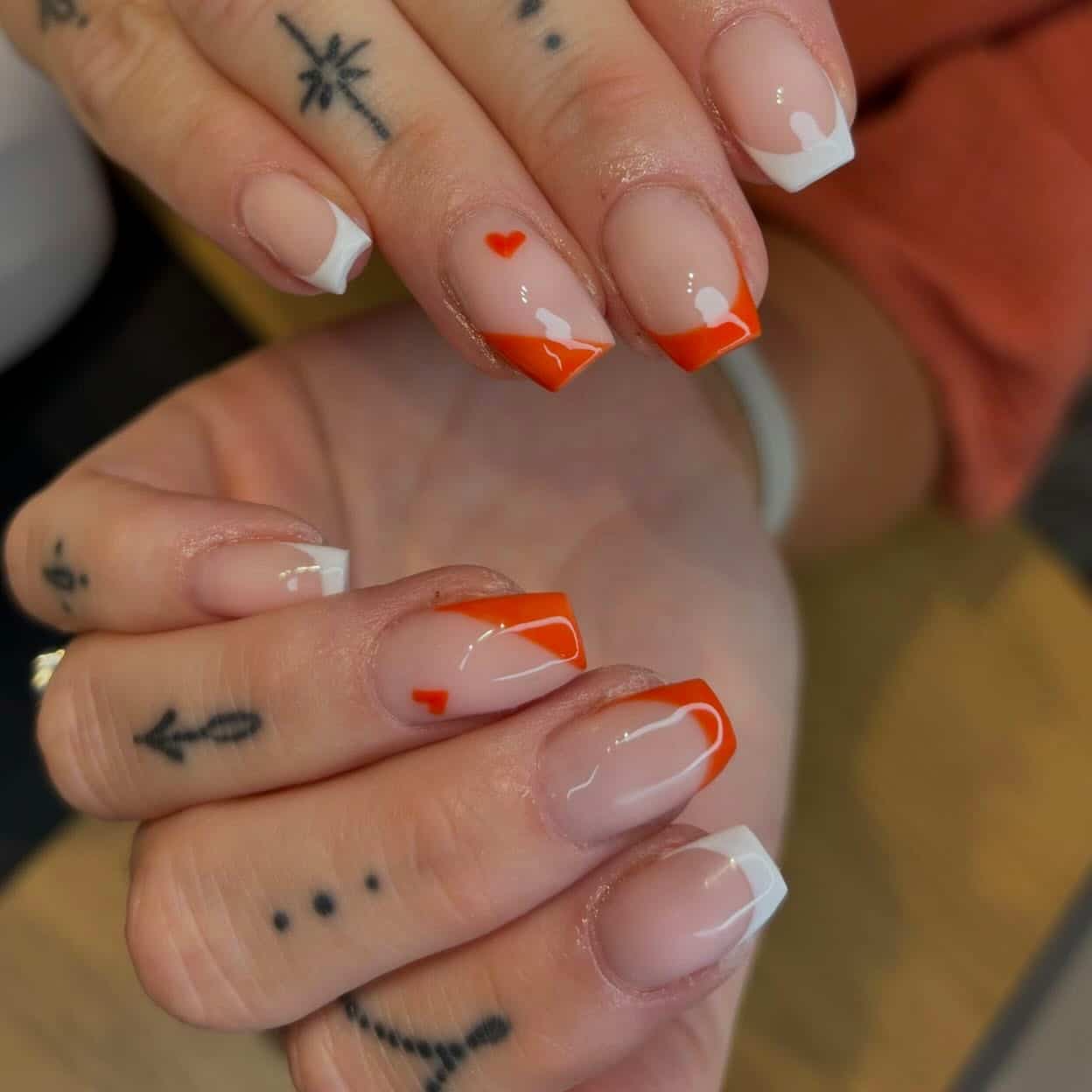 22. Short Square French Nails with Orange Hearts - orange and white nail ideas