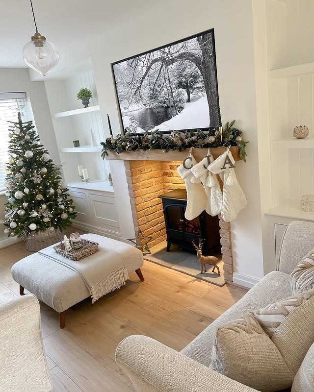 10. Bright Neutral Christmas Living Room with Fireplace - christmas living room decor ideas