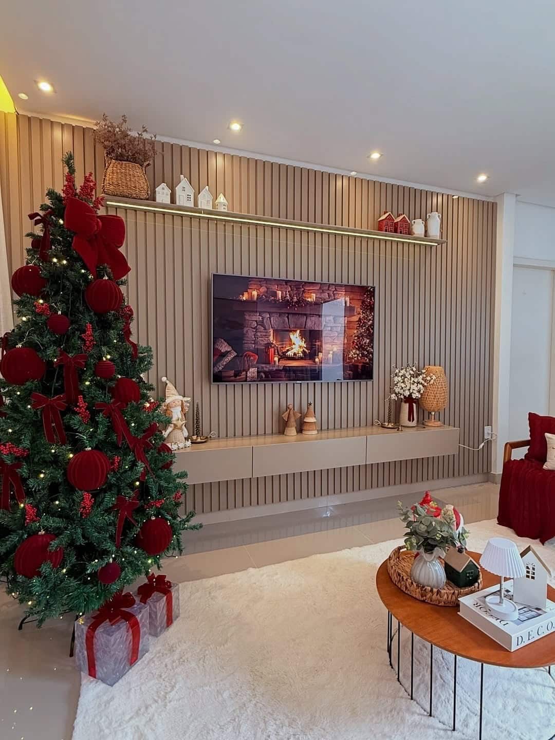 16. Modern Christmas Living Room with Red Statement Decor - christmas living room decor ideas
