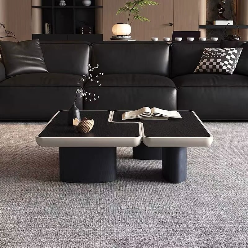 1. Modern Monochrome Lounge in Black and Soft Neutrals - black furniture living room ideas