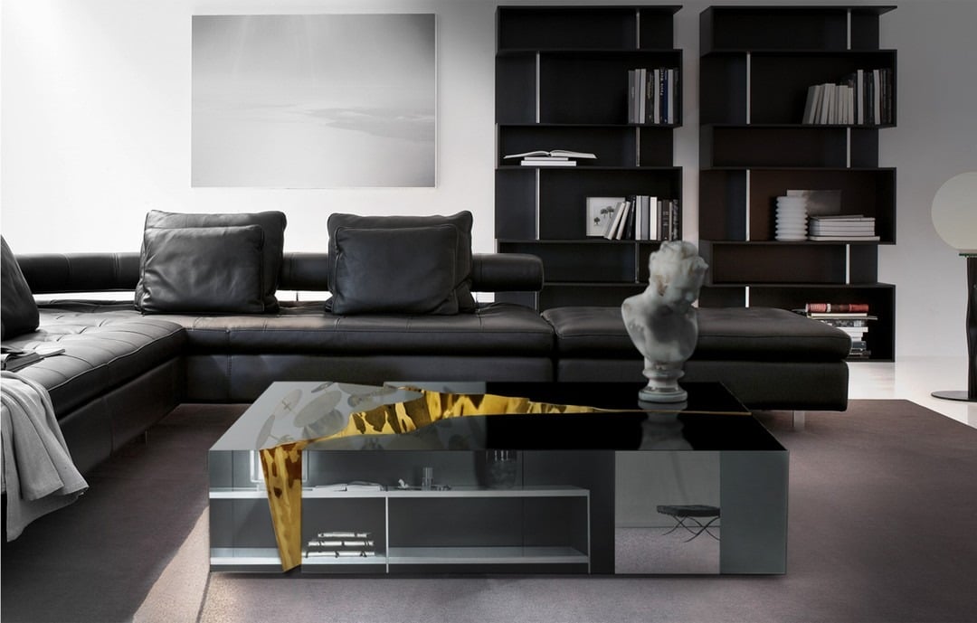 2. Sleek Black Leather Living Room with Charcoal and Gold Accents - black furniture living room ideas