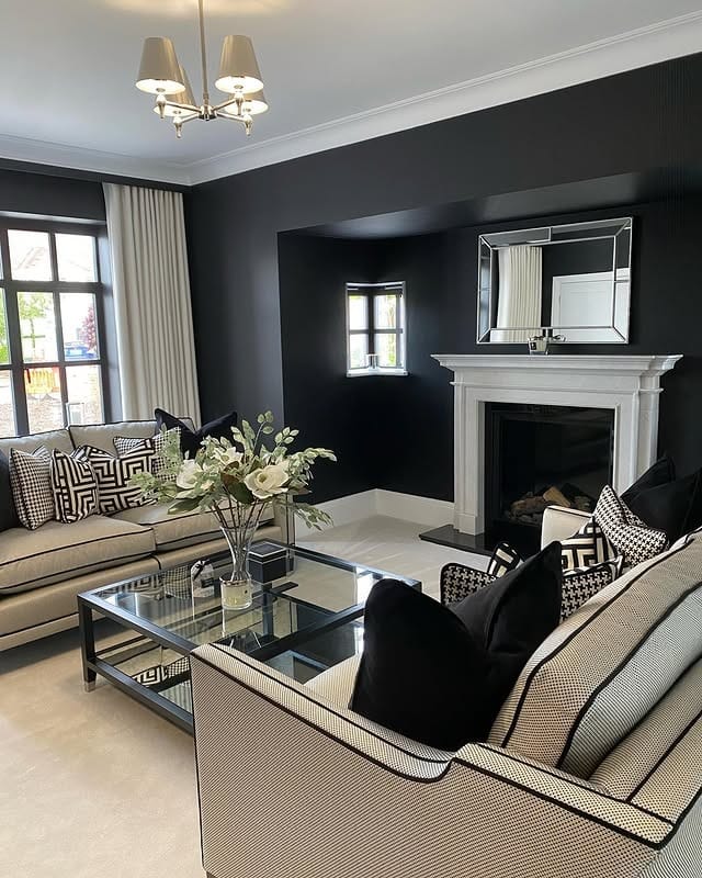 19. Classic Black and White Living Room with Elegant Contrast - black furniture living room ideas