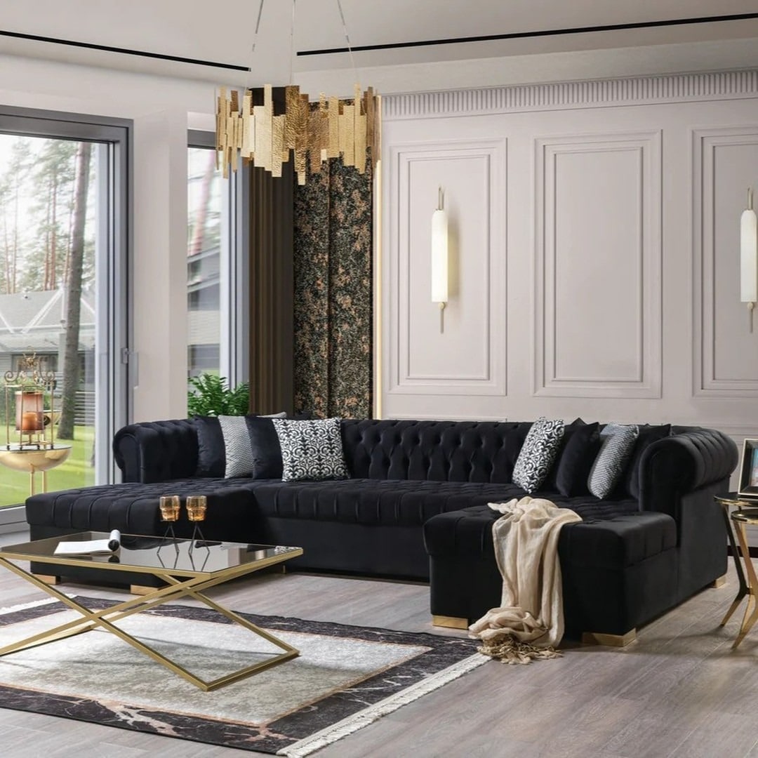 21. Elegant Black Sectional Living Room with Gold and Soft Neutrals - black furniture living room ideas