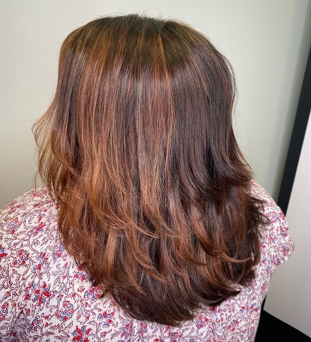 5. Brunette Lob with Cinnamon Tones - Dark Brown Hair with Highlights