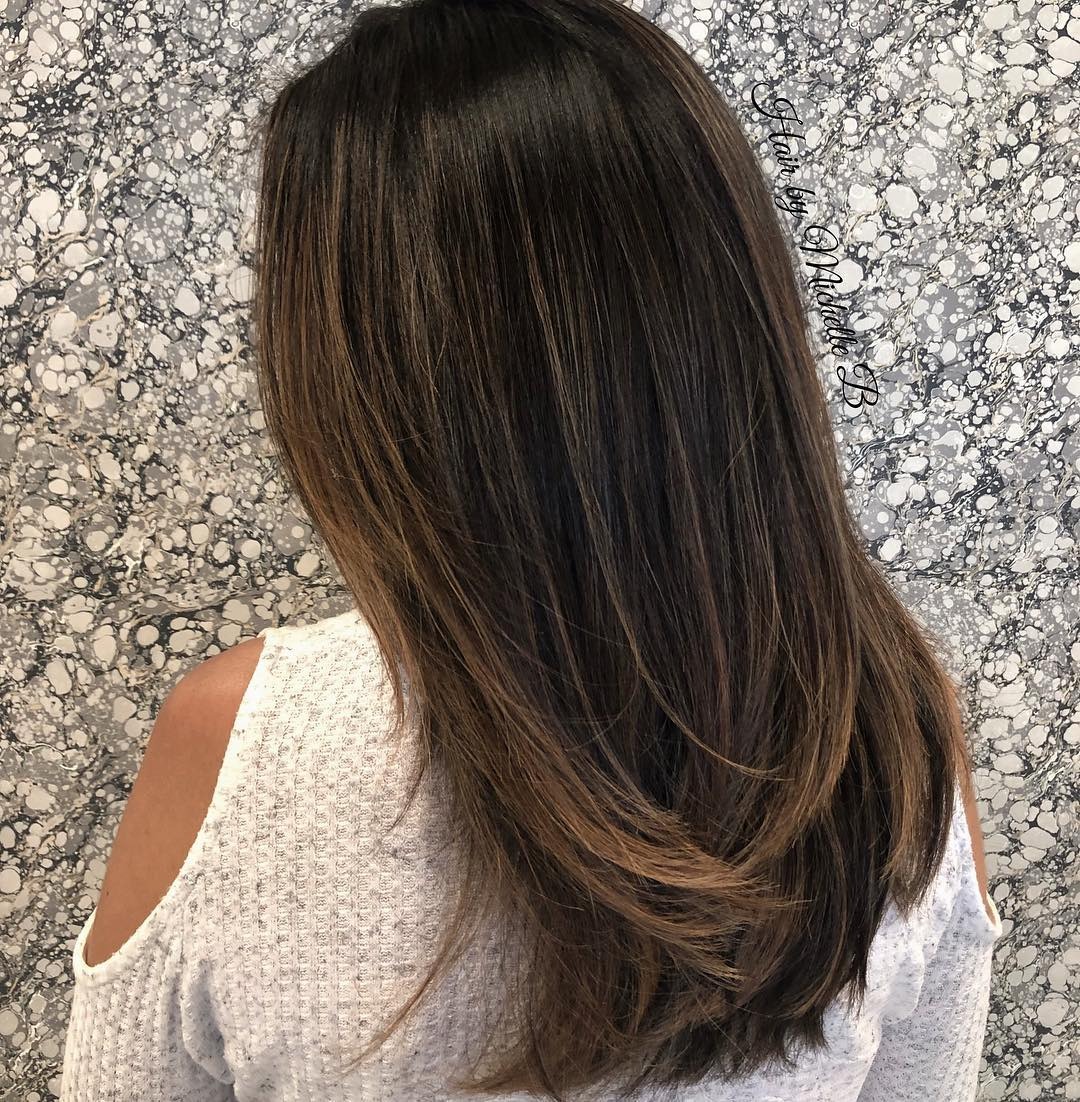 20. Layered Dark Brown Cut with Soft Warm Highlights - Dark Brown Hair with Highlights