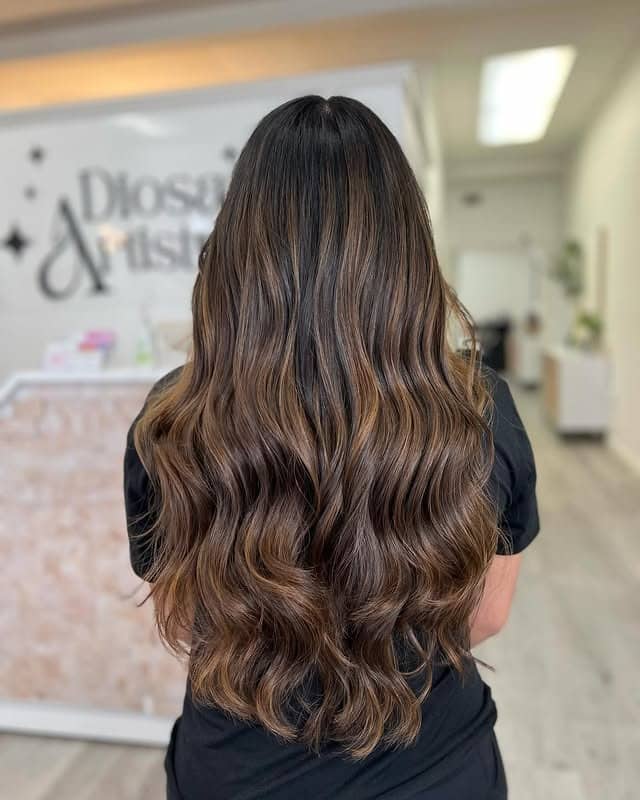 21. Long Dark Brown Waves with Soft Caramel Dimension - Dark Brown Hair with Highlights