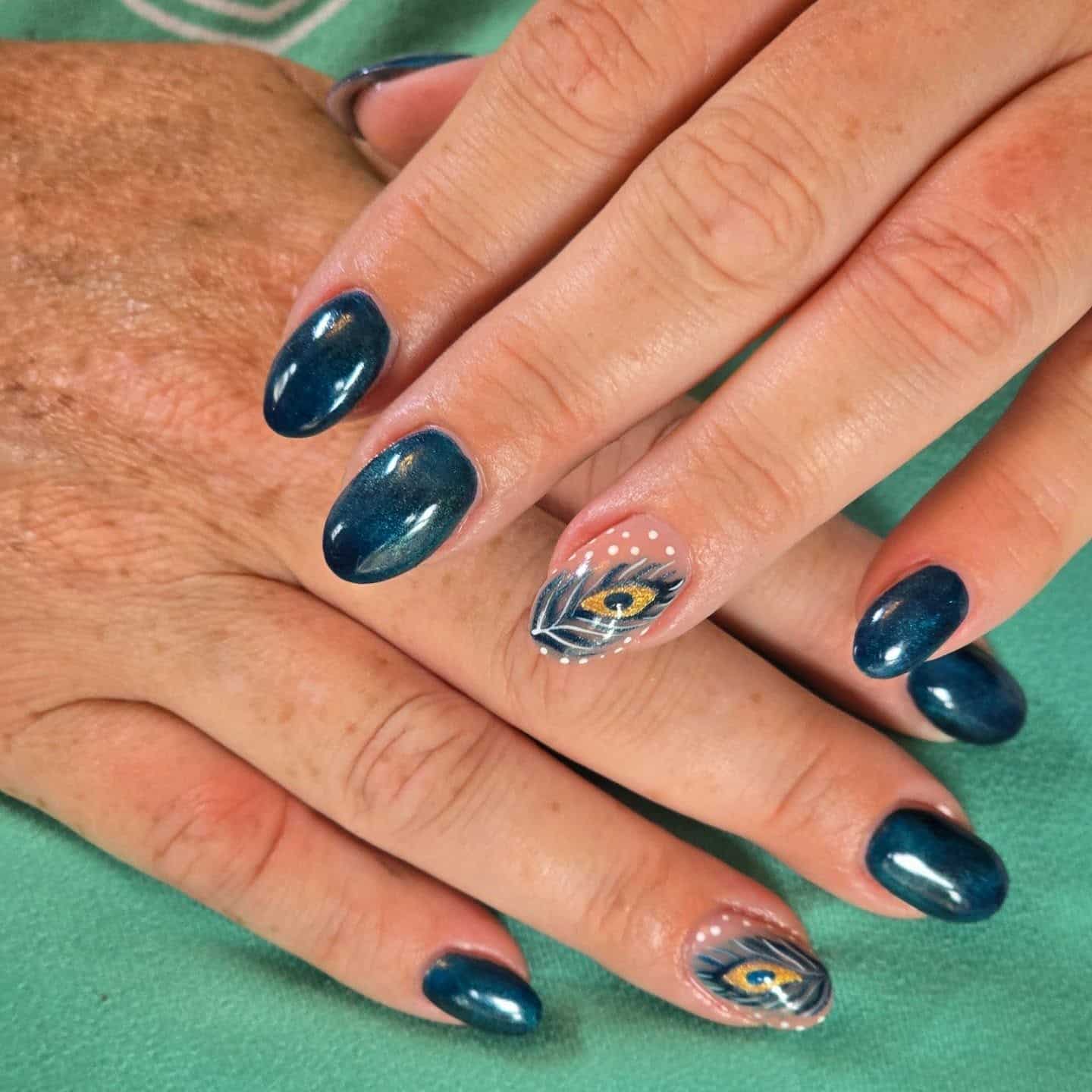 8. Midnight Peacock Feather Nails - peacock nail ideas