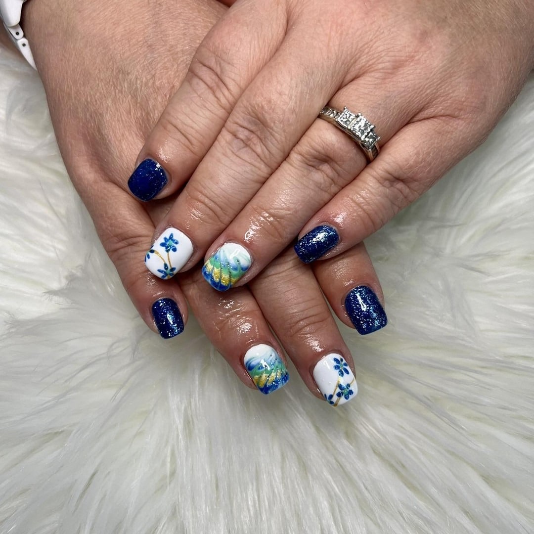 9. Floral Peacock-Inspired Short Nails - peacock nail ideas