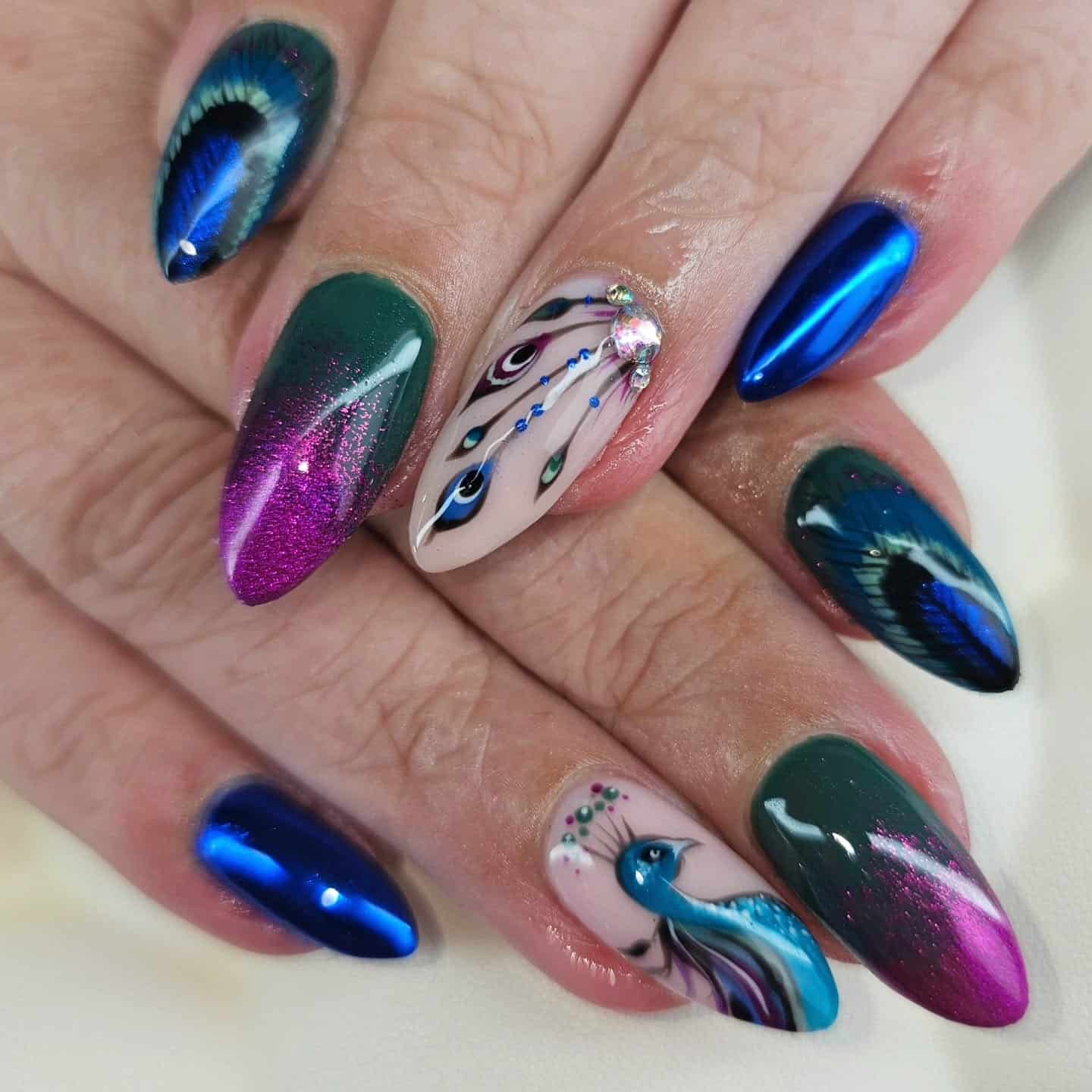 10. Luxe Peacock Chrome and Art Nails - peacock nail ideas