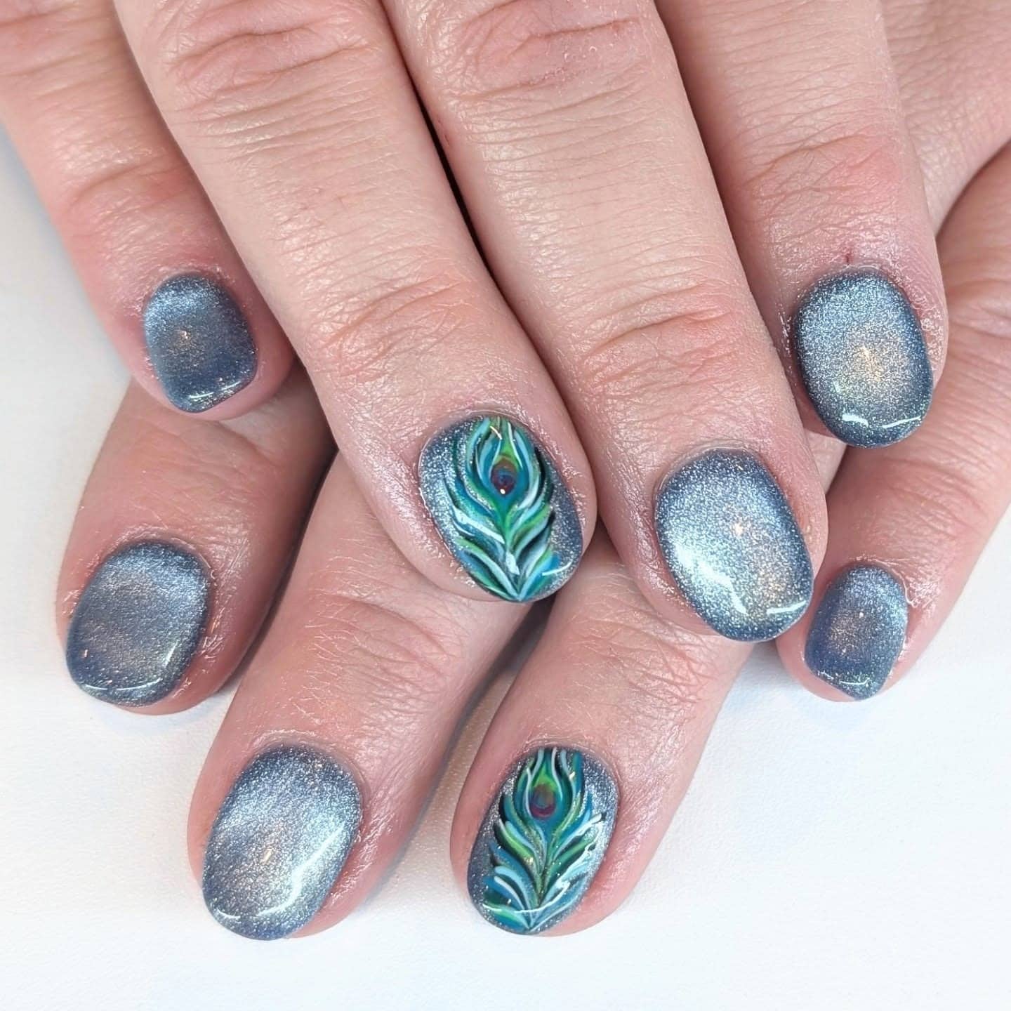 12. Steel Blue Peacock Feather Accent Nails - peacock nail ideas