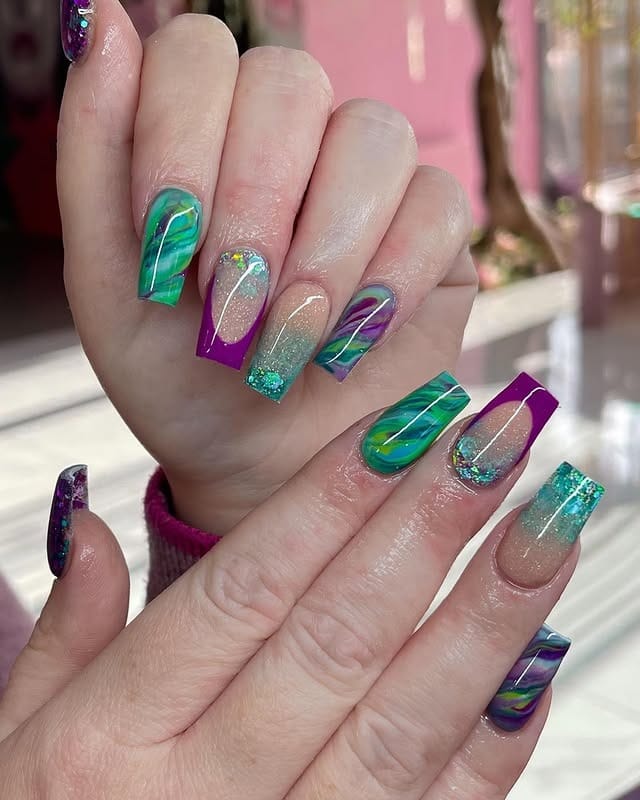 16. Peacock Swirl Coffin Nails in Green and Purple - peacock nail ideas