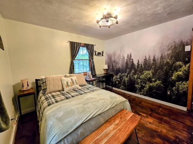 3. Pine Landscape Bedroom in Warm Wood and Muted Green - forest bedroom ideas