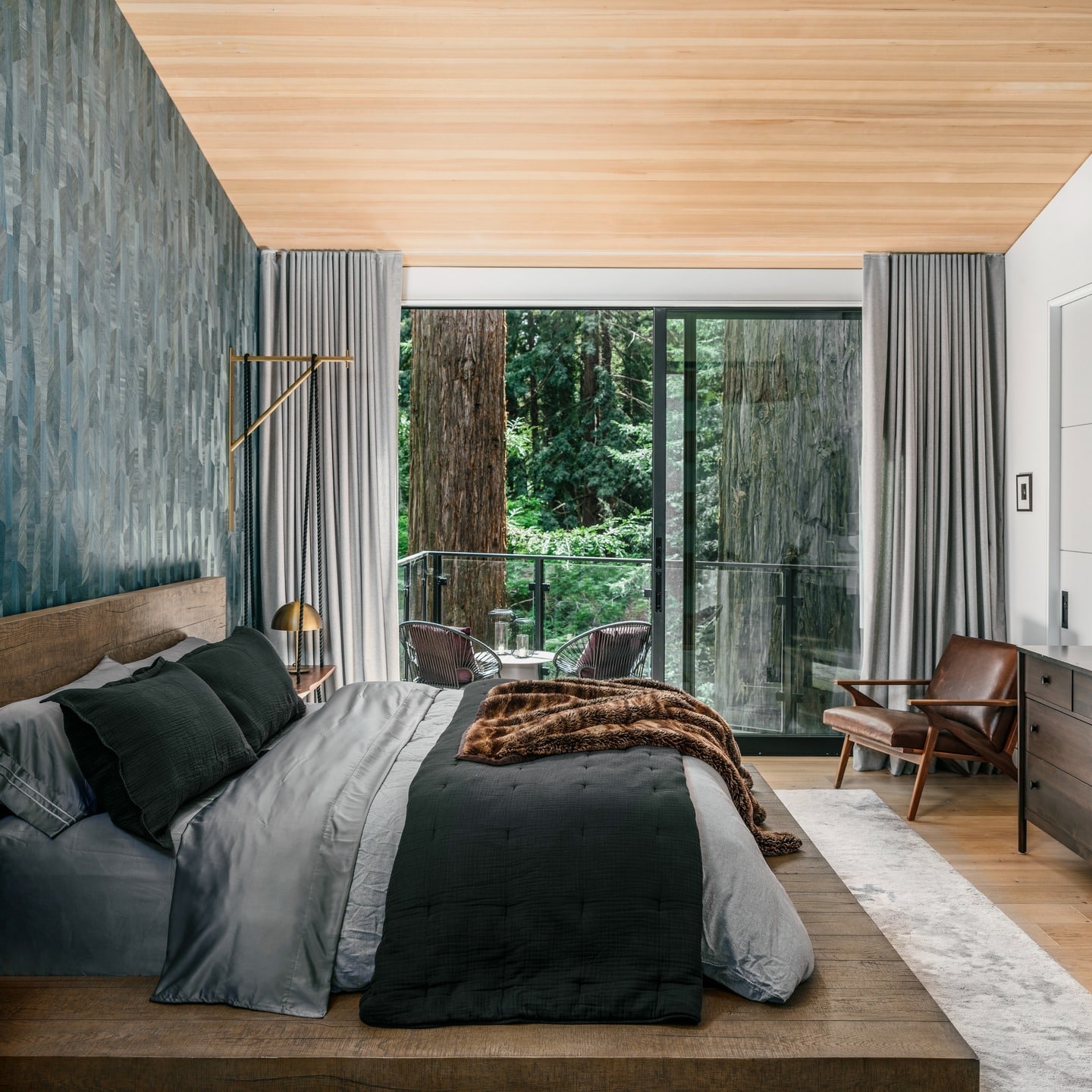 5. Forest View Escape in Charcoal, Wood, and Soft Gray - forest bedroom ideas