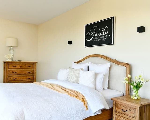 5. Classic European Farmhouse Bedroom in Natural Oak and White - european style bedroom ideas