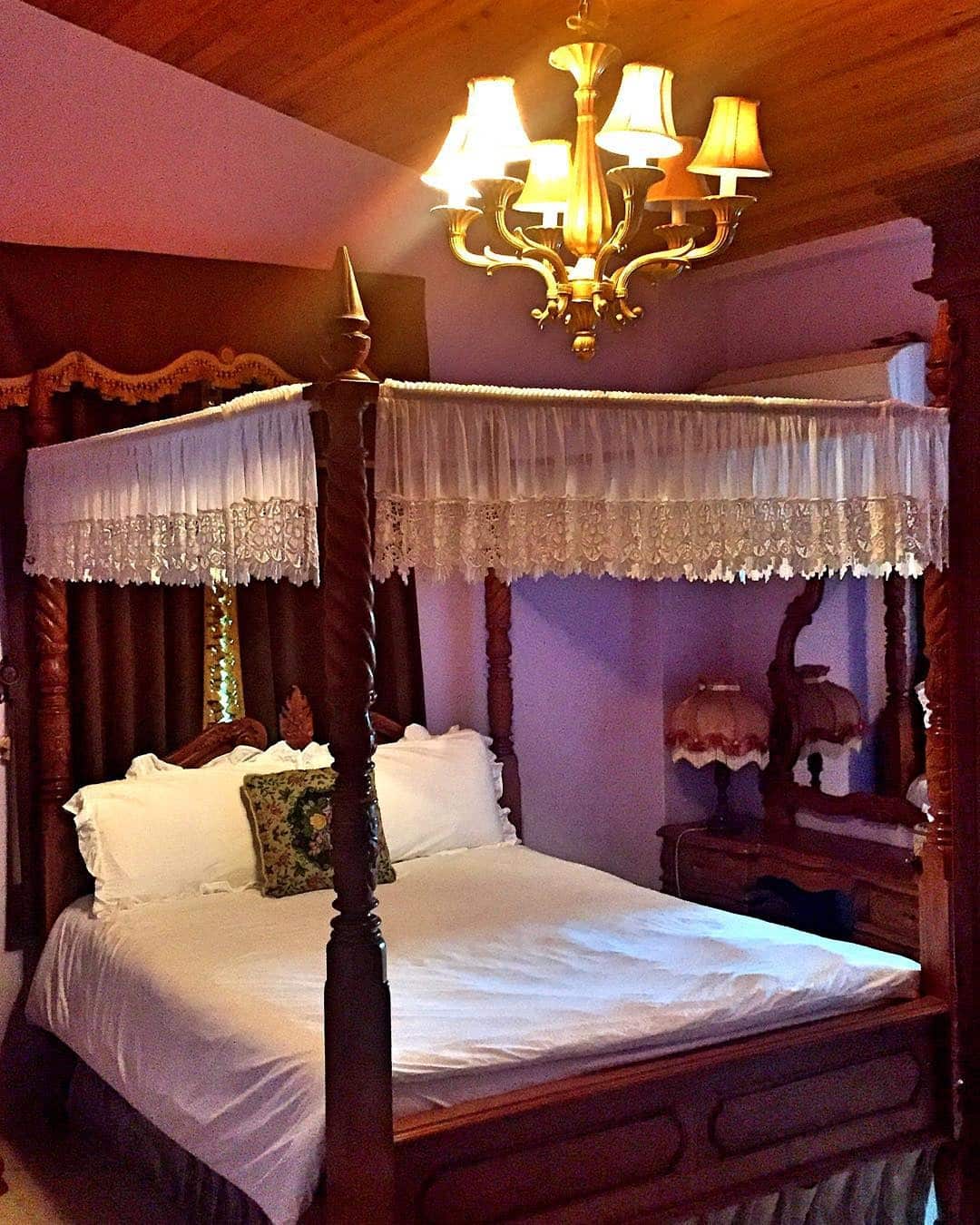 8. Romantic European Canopy Bedroom in Antique Wood and Ivory - european style bedroom ideas