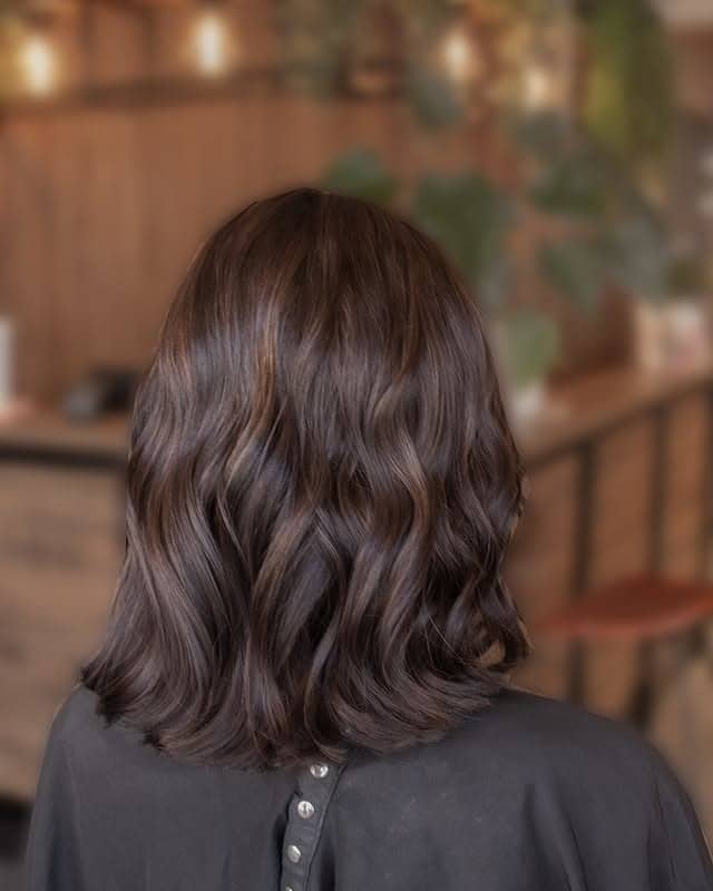 20. Cool Ash Brown Polished Waves - Ash Brown Hair Color