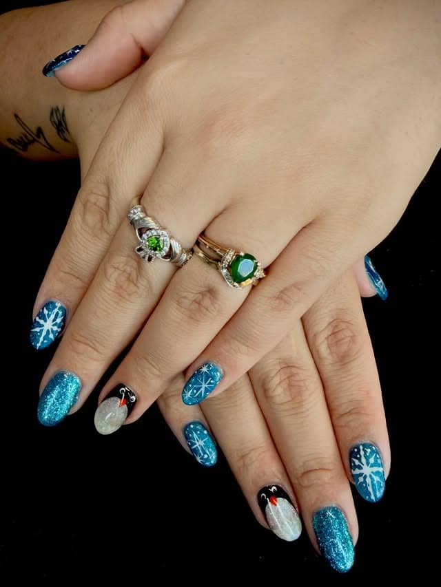 1. Icy Blue Penguin Glitter Nails - penguin nail ideas
